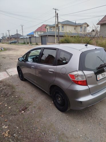 хонда фит 2009: Honda Fit: 2009 г., 1.5 л, Автомат, Бензин, Седан