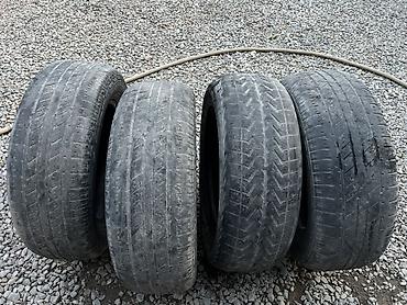 e34 4 4: Комплект автомобильных шин 215/65 R16 98H. Детали: - Типоразмер — 1