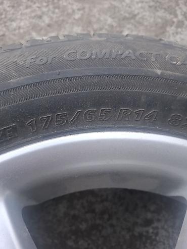 14 r: Легкосплавный диск Honda с шиной Bridgestone - Диаметр диска: R14 - — 2