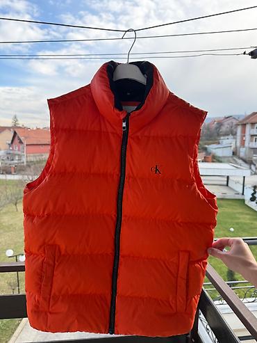 crivit helanke: Prodajem original Calvin Klein muški prsluk, narandžaste boje — 1