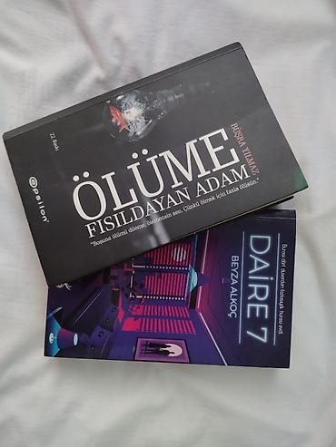 Kitablar hər ikisi originaldi hec bir eziyi yazisi falan yoxdu tep