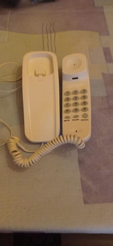 Ev telefonu işləyir təzə kimidir
