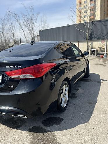 yük qazeleri: Hyundai Elantra: 1.6 l | 2012 il Sedan — 8