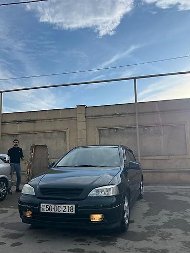 Opel: Model: Opel Astra G sedan Kuzov: 4 qapı, tünd yaşıl rəng Mühərrik və — 2