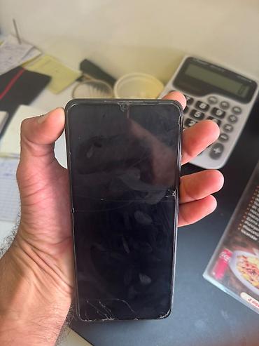 redmi 15 c: Redmi smartfon Məhsul təsviri: - Model: Redmi (arxa qapaqda “Redmi” — 1