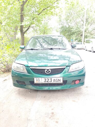 автомобили в рассрочку без первоначального взноса: Mazda 323: 2002 г., 1.6 л, Механика, Бензин, Хэтчбэк