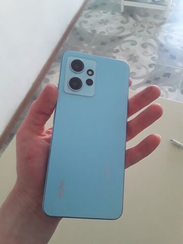 xiaomi redmi 4a: Xiaomi Redmi Note 12, 128 ГБ, цвет - Голубой, 
 Кнопочный, Сенсорный, Отпечаток пальца