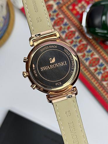 saat omega: Swarovski qadın qol saatı – roze qızılı tonlarda, zərif kristal — 5