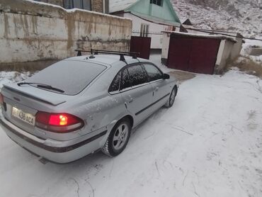 Mazda: Mazda 626: 1997 г., 1.8 л, Механика, Бензин, Седан