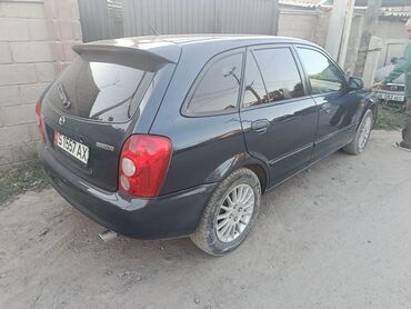 авто соболь: Mazda 323: 2002 г., 1.3 л, Механика, Бензин, Универсал