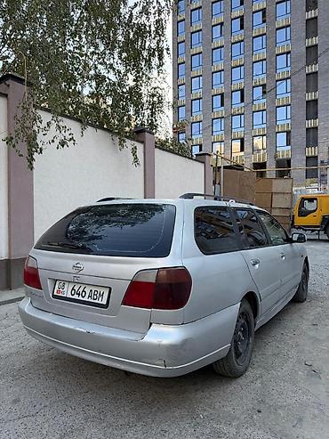 продаю с: Nissan Primera: 2001 г., 2 л, Механика, Бензин, Универсал — 5