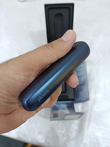 elektron qelyan trendyol: Ploom Aura (Navy Blue) – tütün qızdırma qurğusu satılır. 1 həftə — 4