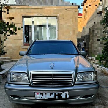 mercedes tulku goz: Mercedes-Benz 240: 2.4 l | 1997 il Sedan