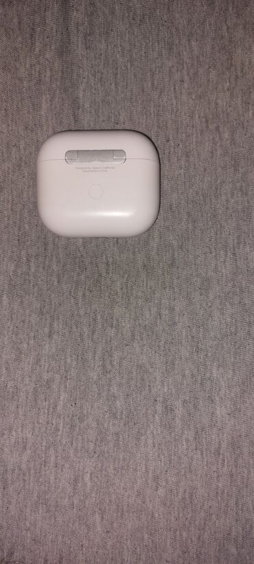 papučica za šivaću mašinu: Bežične slušalice Apple AirPods treće generacije, bele boje. Slušalice