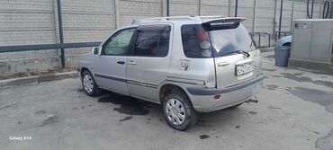 антена на авто: Тойота Раум— компактный 5‑дверный хэтчбек Освещение и стекла: -