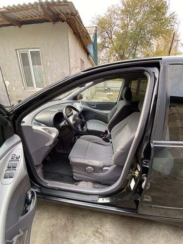 Nissan: Nissan Almera Tino: 2005 г., 1.8 л, Механика, Бензин, Универсал — 10