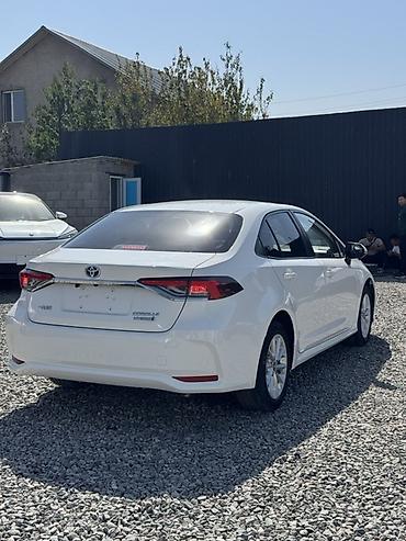 spark 2018: Toyota Corolla: 2019 г., 1.8 л, Вариатор, Гибрид, Седан — 8