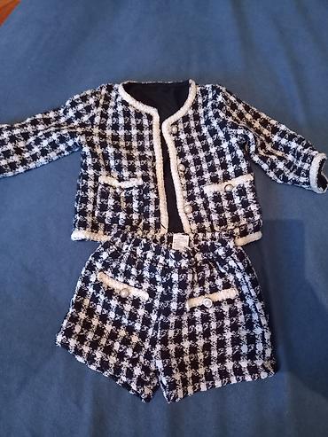 Uşaq geyimləri dəsti 1) Qara-ağ dama naxışlı jaket və şort dəsti -