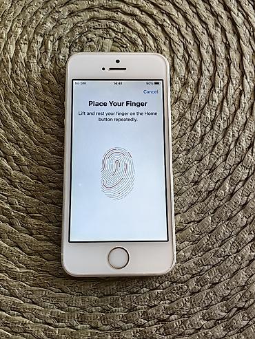 o bag: Iphone SE 2016 beli sa 64 gb memorije, otključan za sve mreže. Telefon — 4