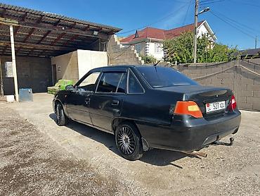 Продажа авто: Daewoo Nexia: 2009 г., 1.6 л, Механика, Бензин, Седан — 7