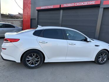 машине арзан: Kia Optima, белый седан бизнес-класса. Кузов и экстерьер: - Белый