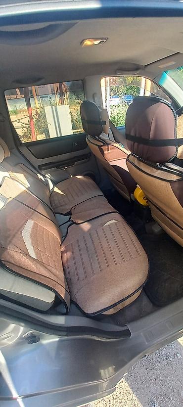 forut satsi: Nissan X-Trail: 2 l | 2002 il Krossover — 6