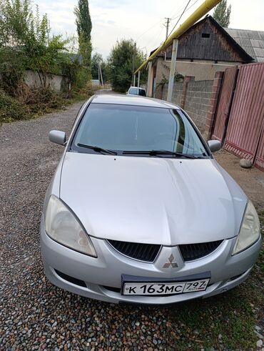 Mitsubishi: Mitsubishi Lancer: 2005 г., 1.6 л, Механика, Бензин