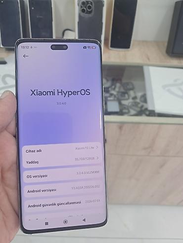 mi 10 t lite: Xiaomi 13 Lite, 128 GB, rəng - Gümüşü, 
 Barmaq izi — 1