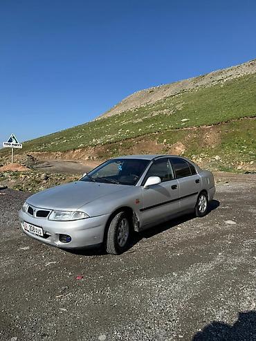 срочное: Mitsubishi Carisma: 1999 г., 1.8 л, Механика, Бензин, Седан — 2