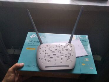 modem optik: TP-LINK modem. Istifadə olunmayıb. Tam təchizatlıdır