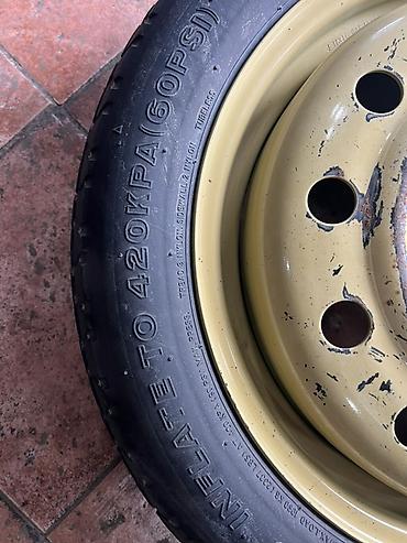14р шина: Докатка (запасное колесо в сборе) - Шина: Bridgestone T145/70D17 110M — 4