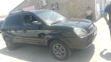 islenmis hyundai avtomobilleri satisi: Hyundai Tucson, qara rəng, Azərbaycan nömrə nişanı 10-US-736 — 10