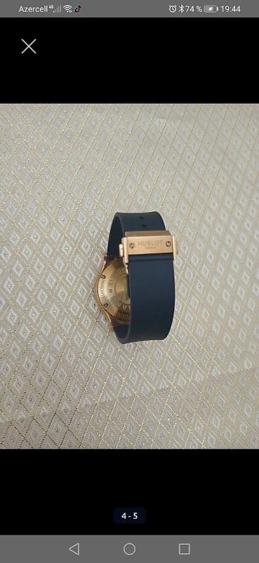 3d saatlar: Hublot üslubunda kişi qol saatı - Korpus: qızılı tonlu metal, ön — 3
