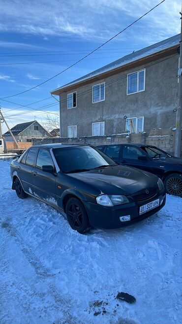 Mazda: Mazda 323: 1999 г., 1.6 л, Механика, Бензин, Седан