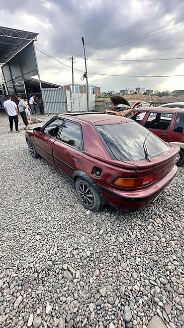 mazda 626 1990: Mazda 323: 1996 г., 1.6 л, Механика, Бензин, Хэтчбэк — 2