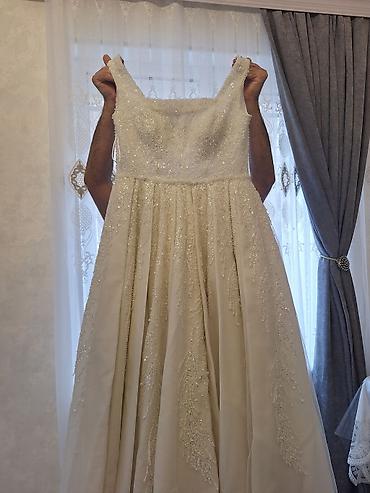 Toy paltarları və aksesuarları: Ağ rəngli gəlinlik paltarı "Cemal Yılmaz Fashion" mağazasından alınıb — 2