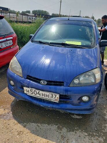 спринтер дом: Автомобиль Daihatsu синего цвета с характерным дизайном кузова. Модель