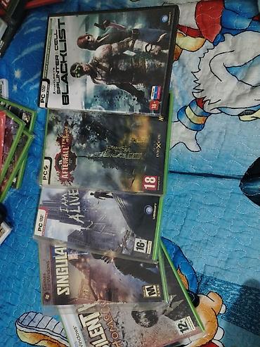 Oyun diskləri: PC üçün orijinal DVD oyun diskləri paketi Paketdə olan adlar: - — 21