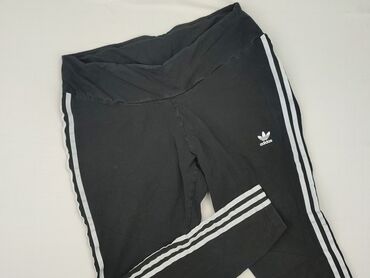 markowe dżinsy: Czarne legginsy damskie marki Adidas, charakteryzujące się trzema