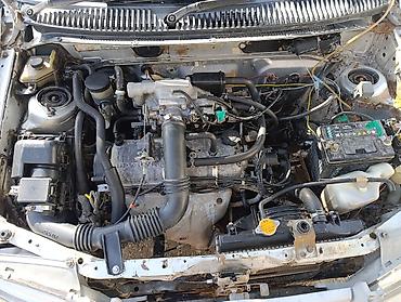 215 65 16 с: Mazda Demio (DW) — компактный хэтчбек/минивэн серебристого цвета с — 4