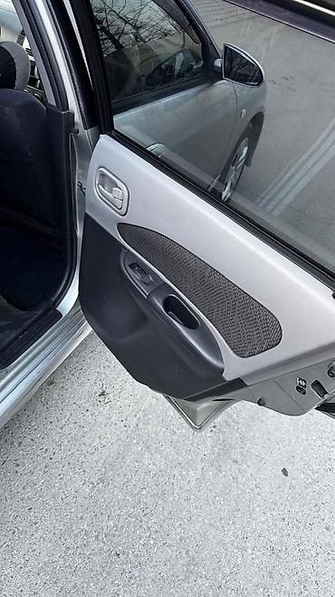 Nissan: Nissan Wingroad: 2003 г., Универсал — 6