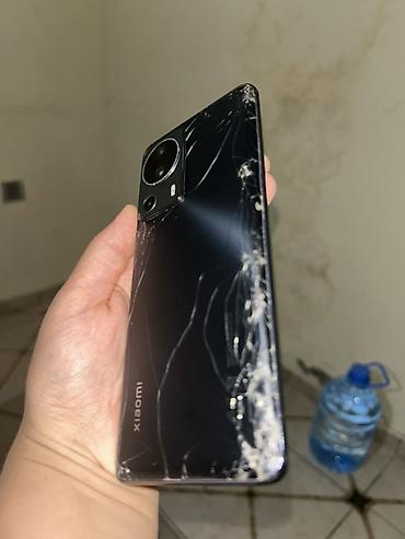 Мобильные телефоны: Xiaomi 12 Lite, 128 ГБ, цвет - Черный, 
 Битый — 4