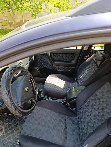 opel astra 2015: Opel Astra Caravan (universał) – tünd mavi rəng, 5 qapı, geniş baqajlı — 5