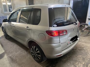Mazda: Mazda Demio: 2004 г., 1.3 л, Автомат, Бензин, Седан