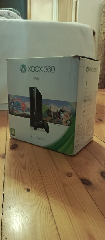 Xbox 360 & Xbox: X Box 360e 4GB. PlayStation-dan sonra bu konsolda oynaya bilmədiyim və