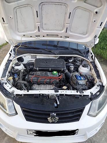byd qin plus: Saipa Saina (sedan), ağ rəng. Masin Mastaga erazisinde yerlesir, tam — 9