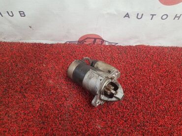 Другие автозапчасти: Стартер Mazda Demio DY ZJ-VE 1.3 2003 (б/у) ДВИГАТЕЛЬ / АКПП - в