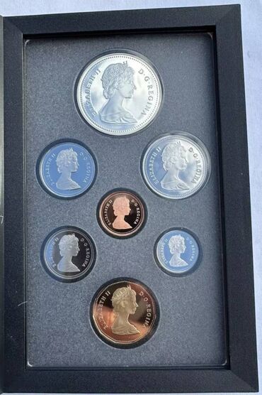 rus pulu nece manatdir: Сувенирный набор монет Канады Пруф 1988 год. 1 доллар серебро 0.500