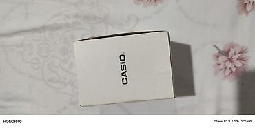 takema saat: Casio qol saatı – qızılı rəngli, kvadrat/örtülü düzbucaqlı korpuslu — 3