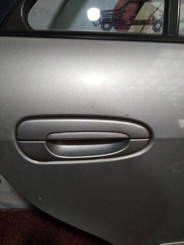 гиря с широкой ручкой: Задняя правая дверная ручка Mazda